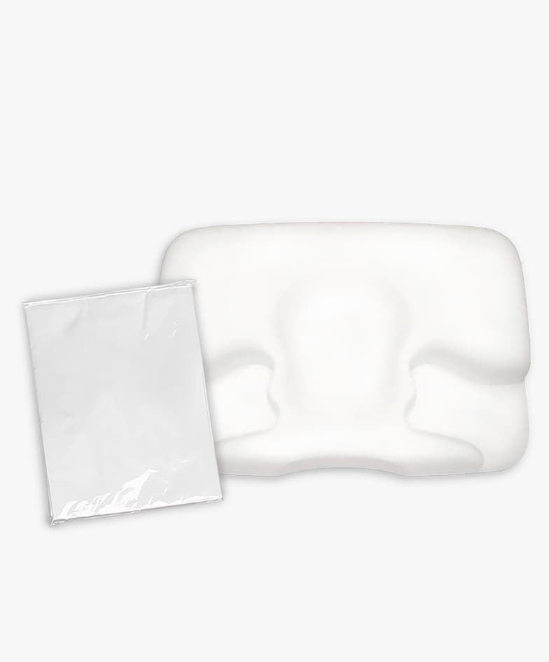 Capa de algodão embalada, ao lado do Travesseiro Multi Máscaras (travesseiro vendido à parte)